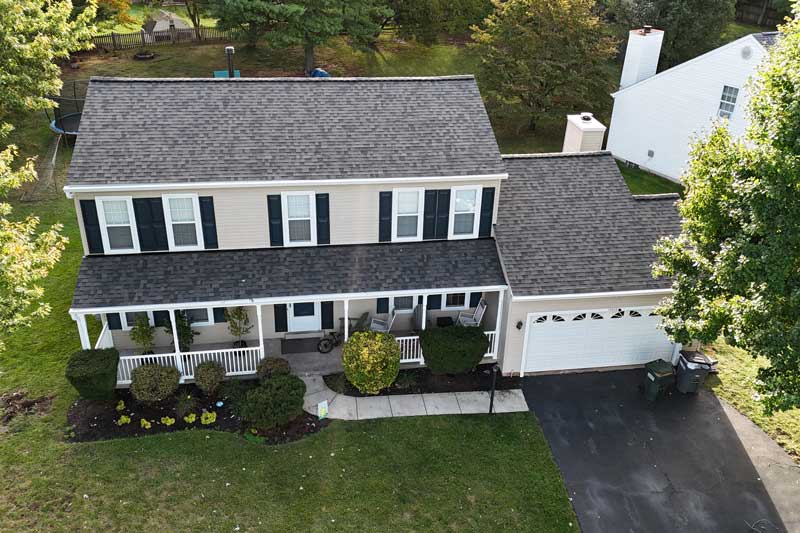 brand new home with a finished roof built by roofing contractors