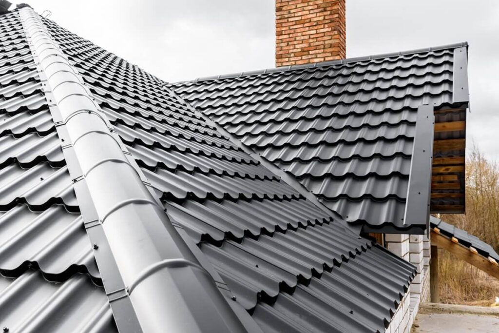 construction of the roof of the house with metal tiles
