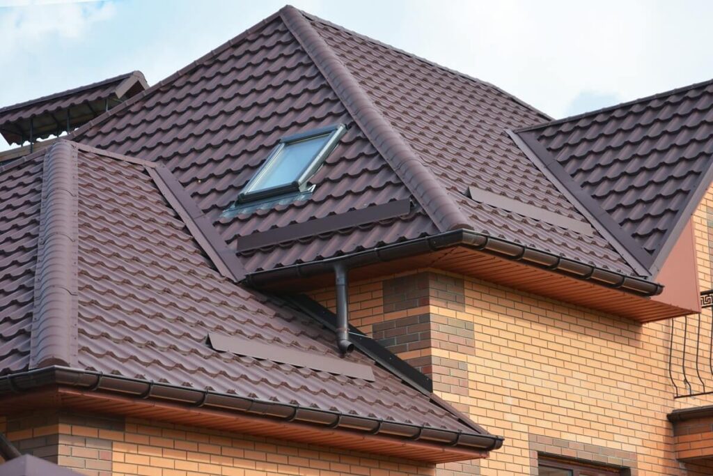 metal tiled expensive roofing construction with a skylight