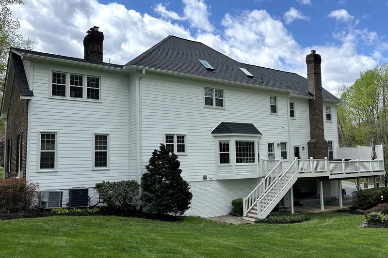 new bay window installation on the back of a house