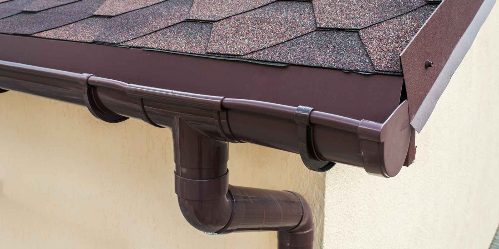 Plastic drainage on the roof near the shingles.