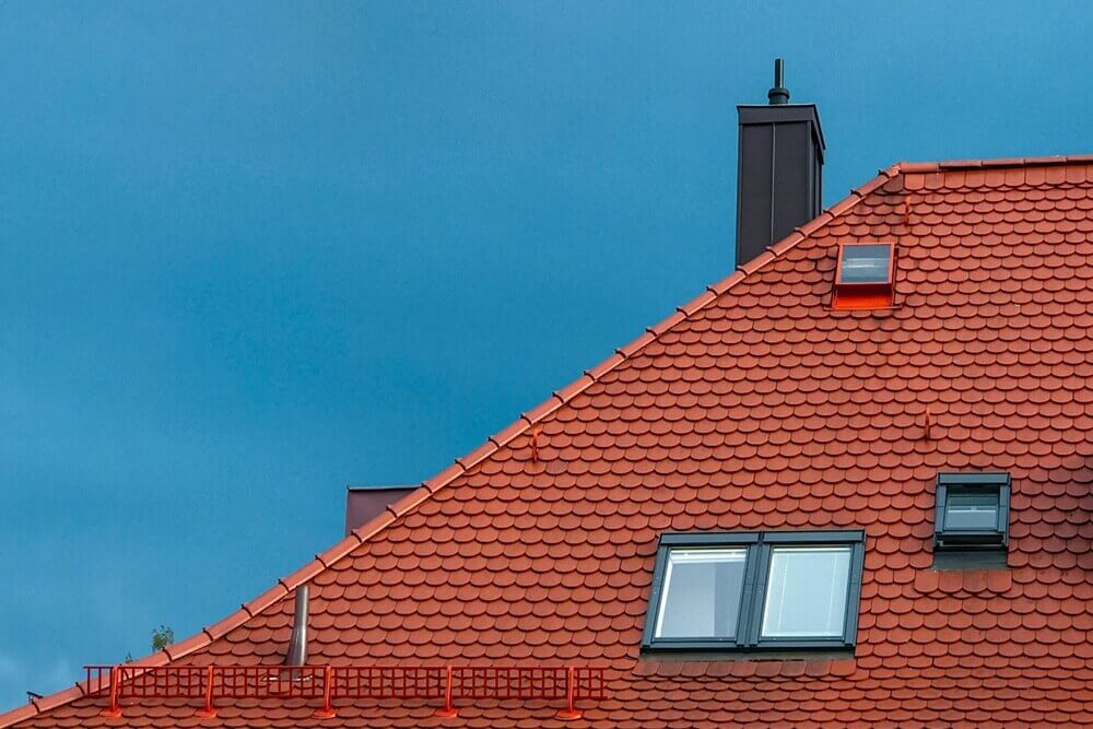 new red shingle roof installed