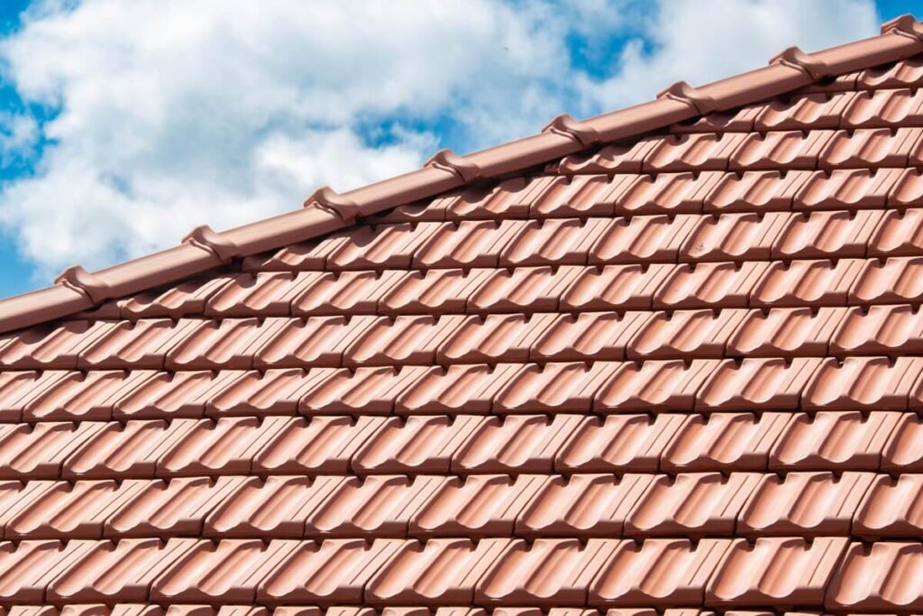 new red tiles roof and blue sky