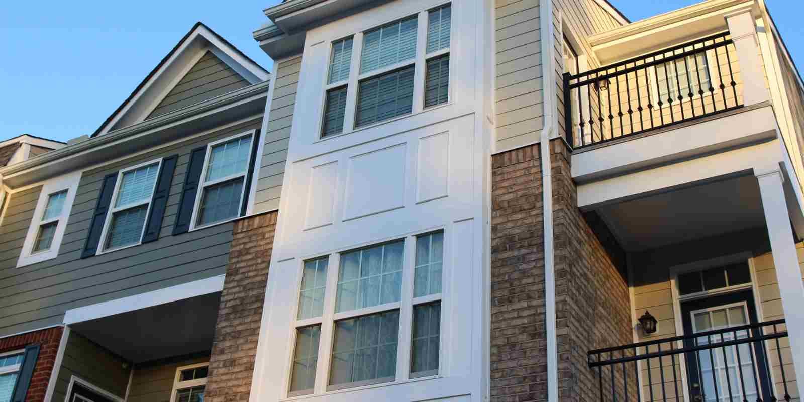 Modern townhouse in Virginia with new windows installed by local contractors.