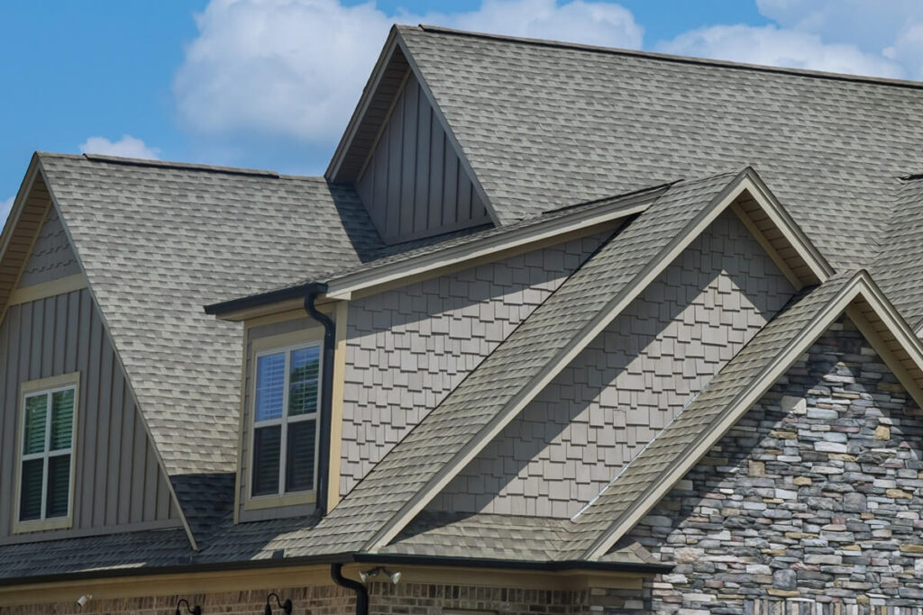 roof construction of a building roof that is covered with new asphalt shingles
