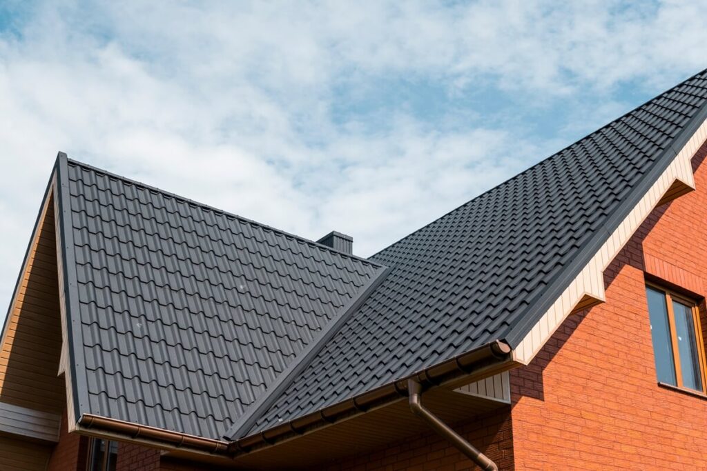 roof covered with tile effect PVC coated brown metal roof sheets