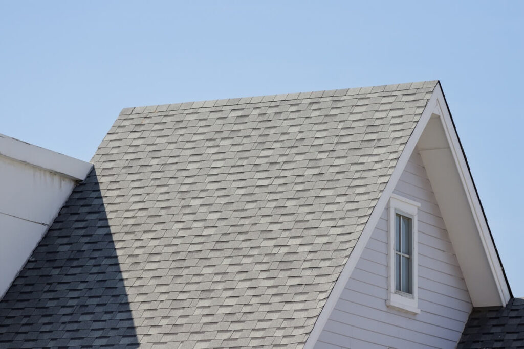 roof shingles with garret house on top of the resident