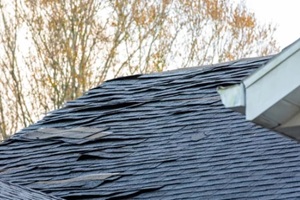 home roof damaged by storm